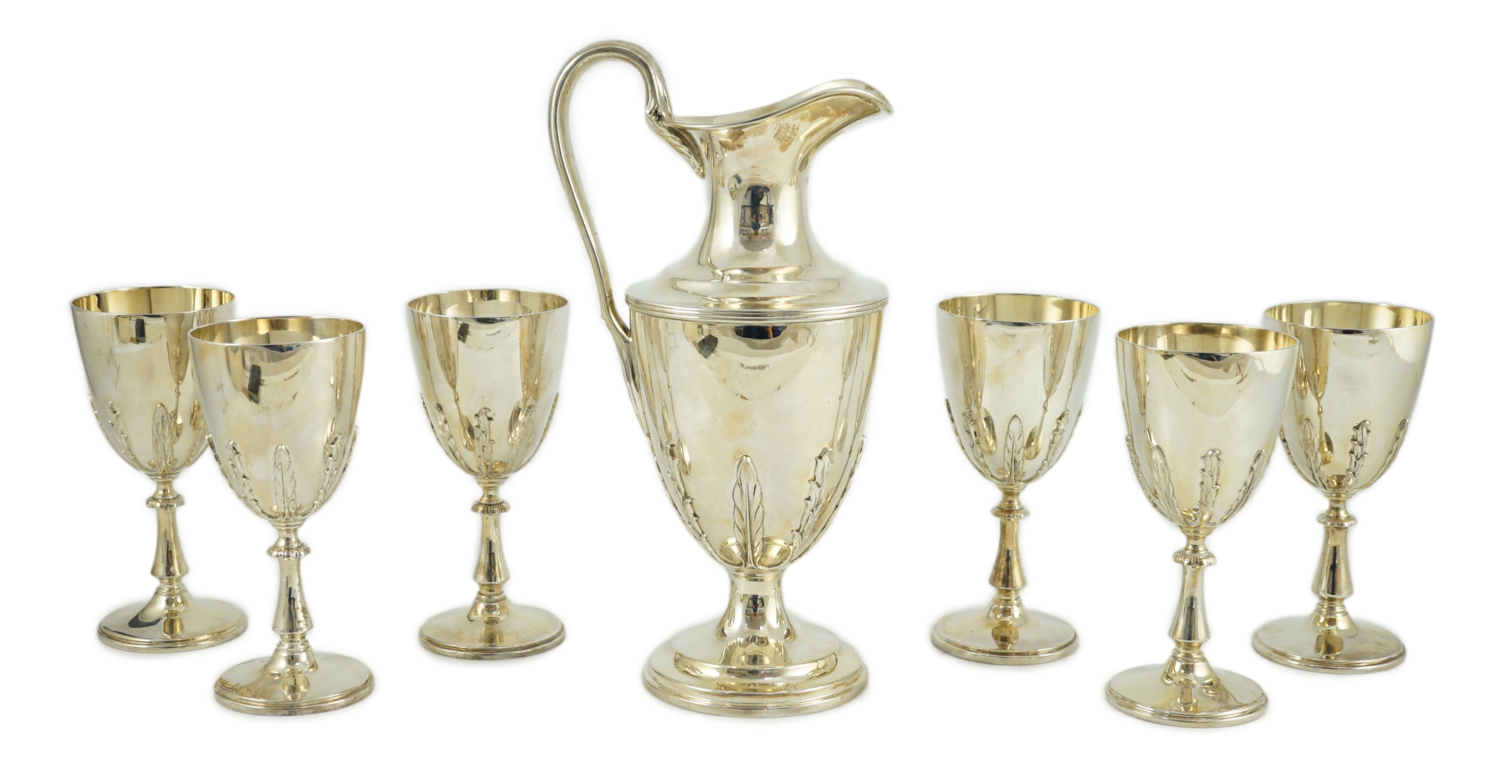 A modern cased silver ewer and six matching goblets by Courtman Silver Ltd